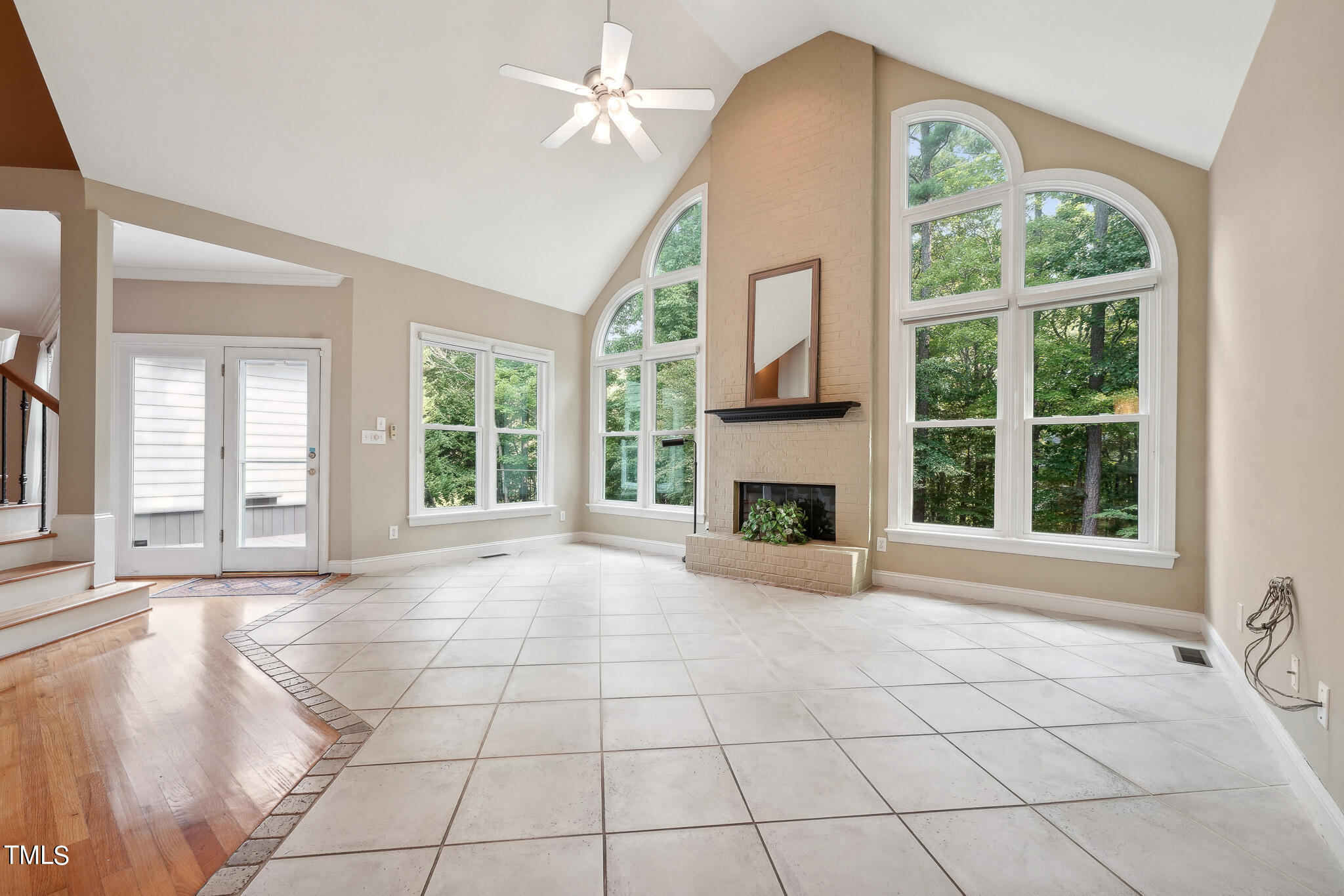 2508 Barton Ridge Court Raleigh, NC 27613 - Photo 8 of 41 a view of an empty room with a fireplace and a window