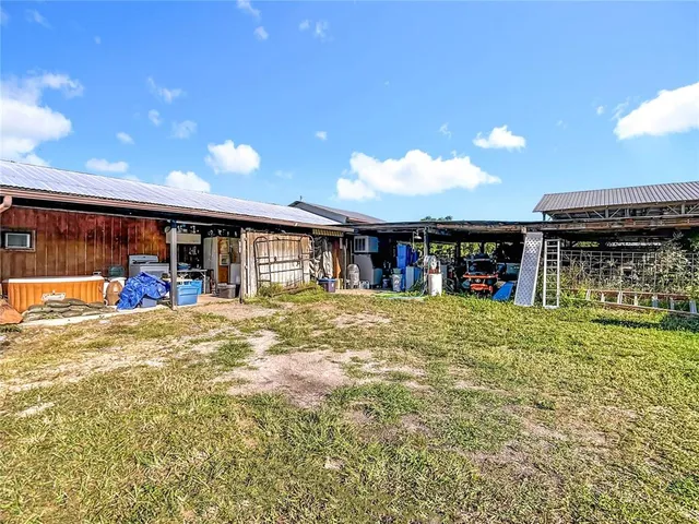 a view of a house with a swimming pool