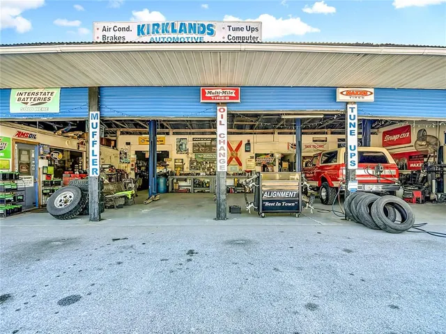 a view of parking garage with cars