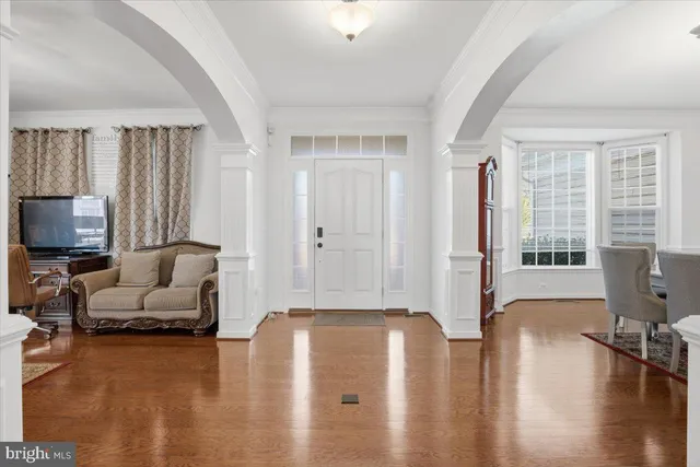 a kitchen with a sink appliances and cabinets