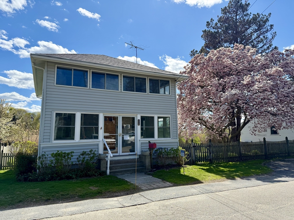 175 Spring Street, Unit 1 Hull, MA 02045 - Photo 15 of 15 a front view of a house with garden