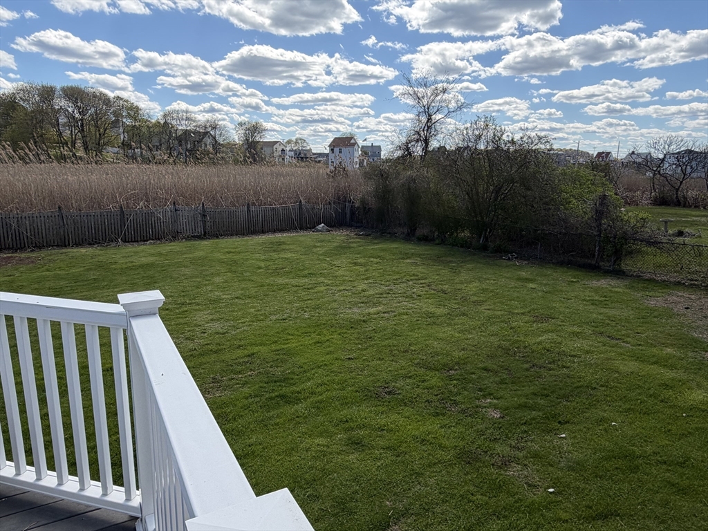175 Spring Street, Unit 1 Hull, MA 02045 - Photo 8 of 15 a view of a backyard