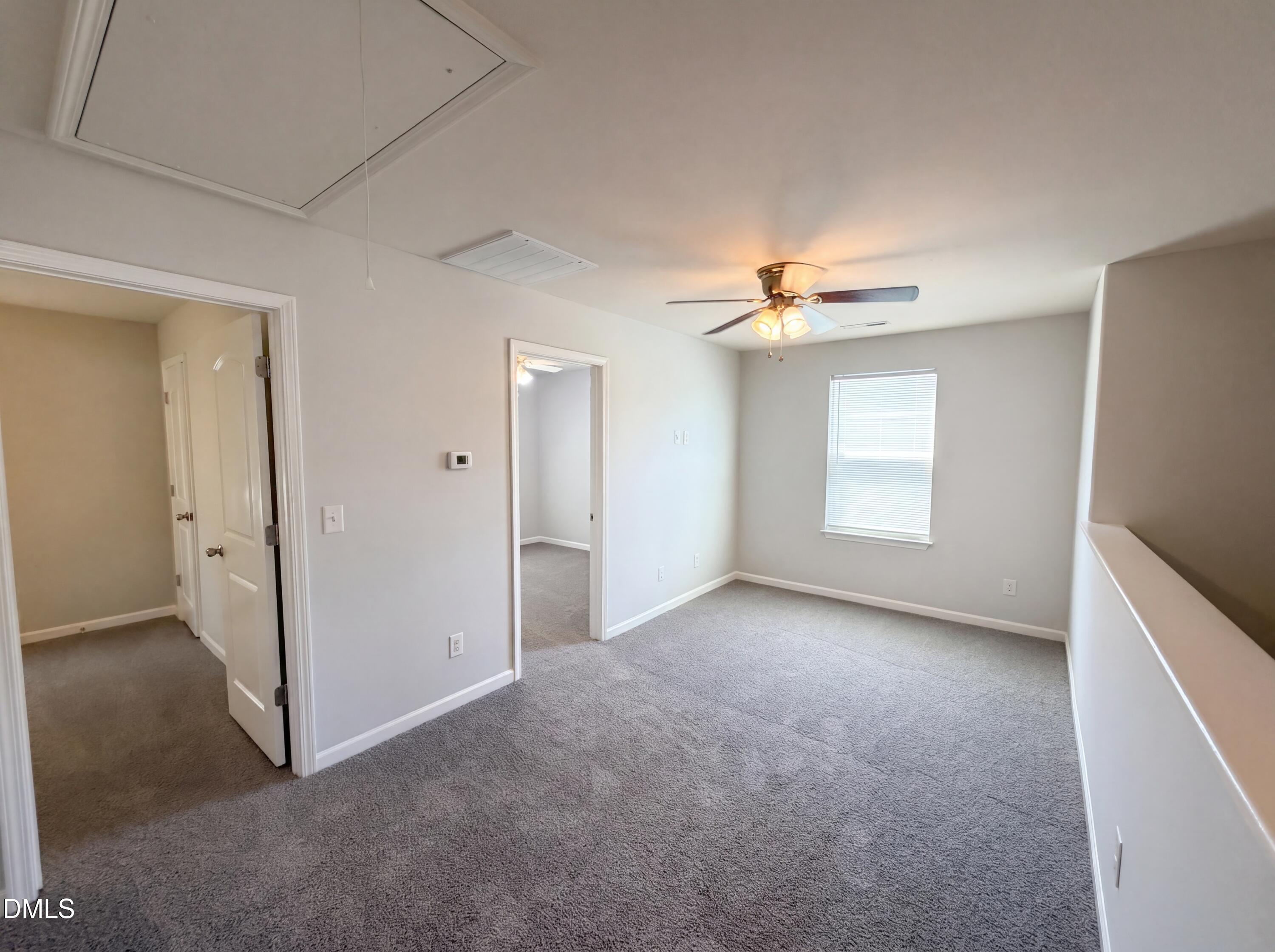 4716 Queen Pierrette Street Raleigh, NC 27610 - Photo 11 of 15 a view of a livingroom with a staircase