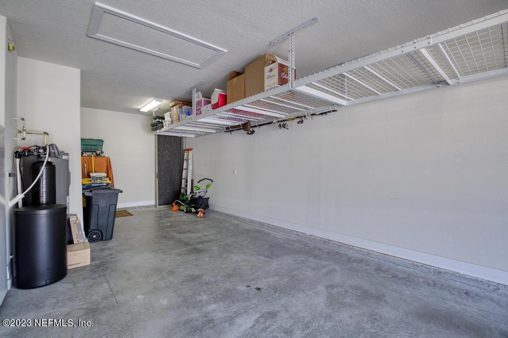 280 Winding Path Drive Ponte Vedra, FL 32081 - Photo 32 of 94 Golf Cart Bay & Hanging Storage Racks