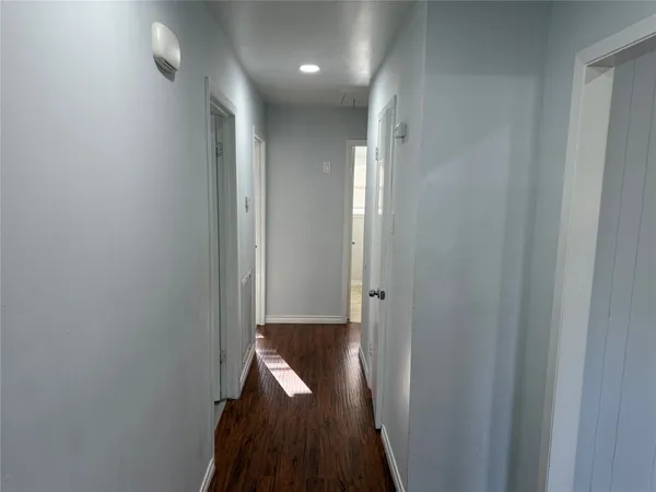 a view of hallway with stairs