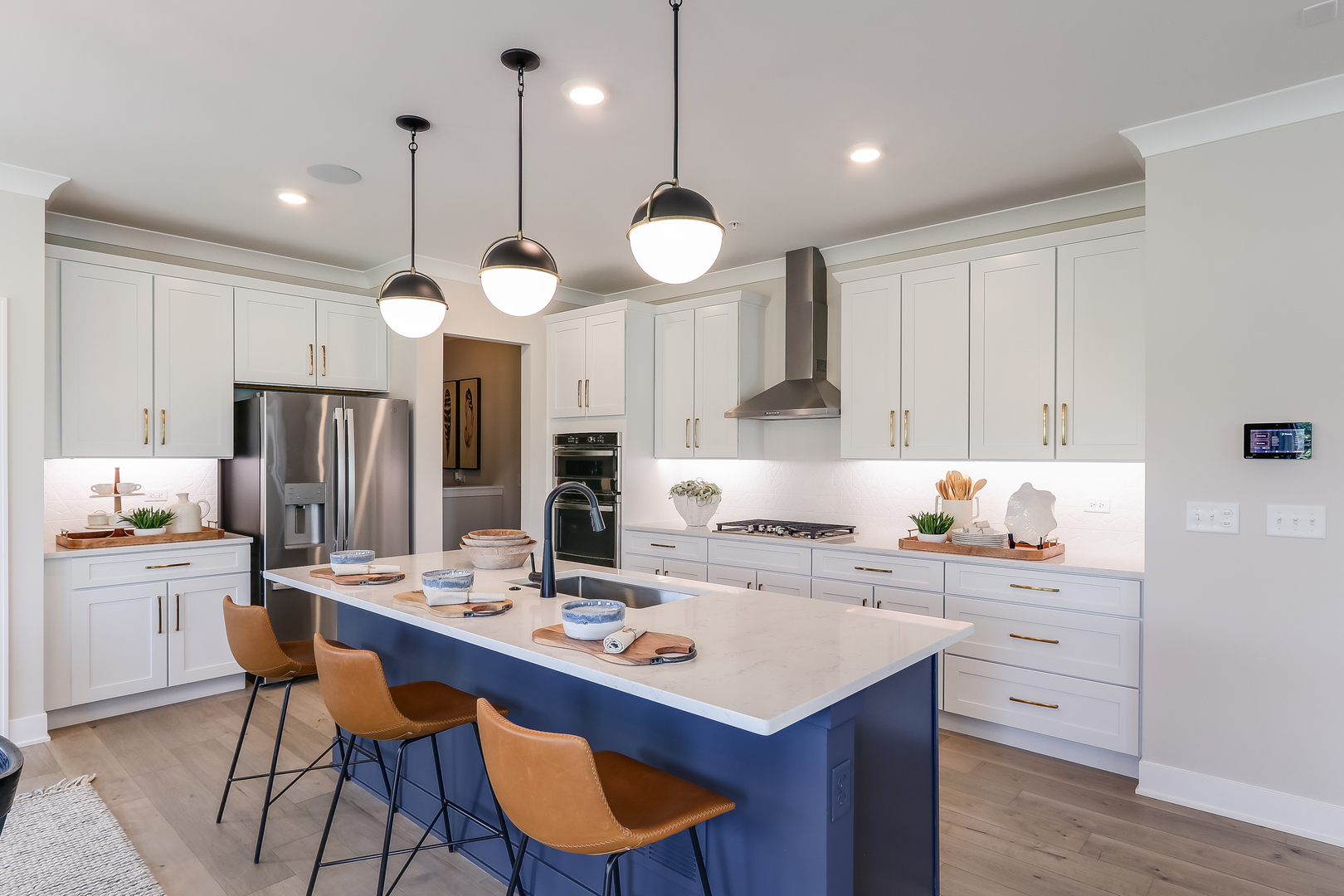 5 Hawthorn Rdg Drive Hawthorn Woods, IL 60047 - Photo 13 of 31 a kitchen with a center island wooden floor cabinets and appliances