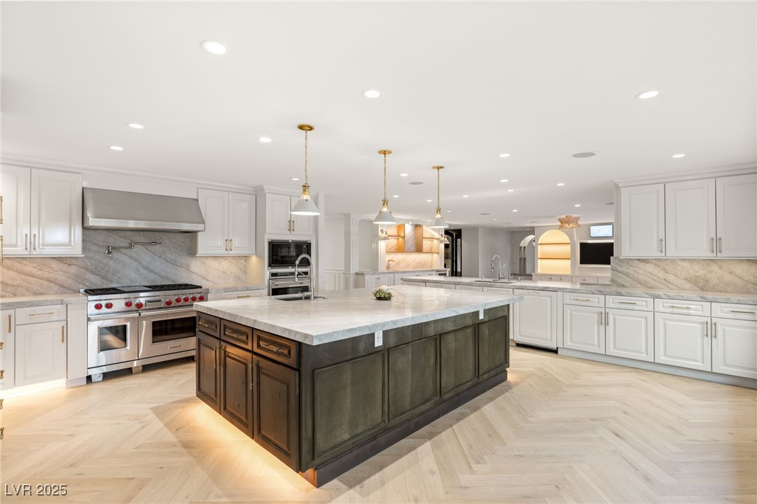 105 Quail Run Road Henderson, NV 89014 - Photo 12 of 88 Kitchen featuring stainless steel appliances, rece