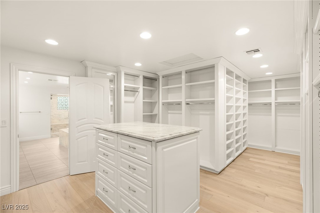 105 Quail Run Road Henderson, NV 89014 - Photo 29 of 88 Spacious closet with light wood-style floors
