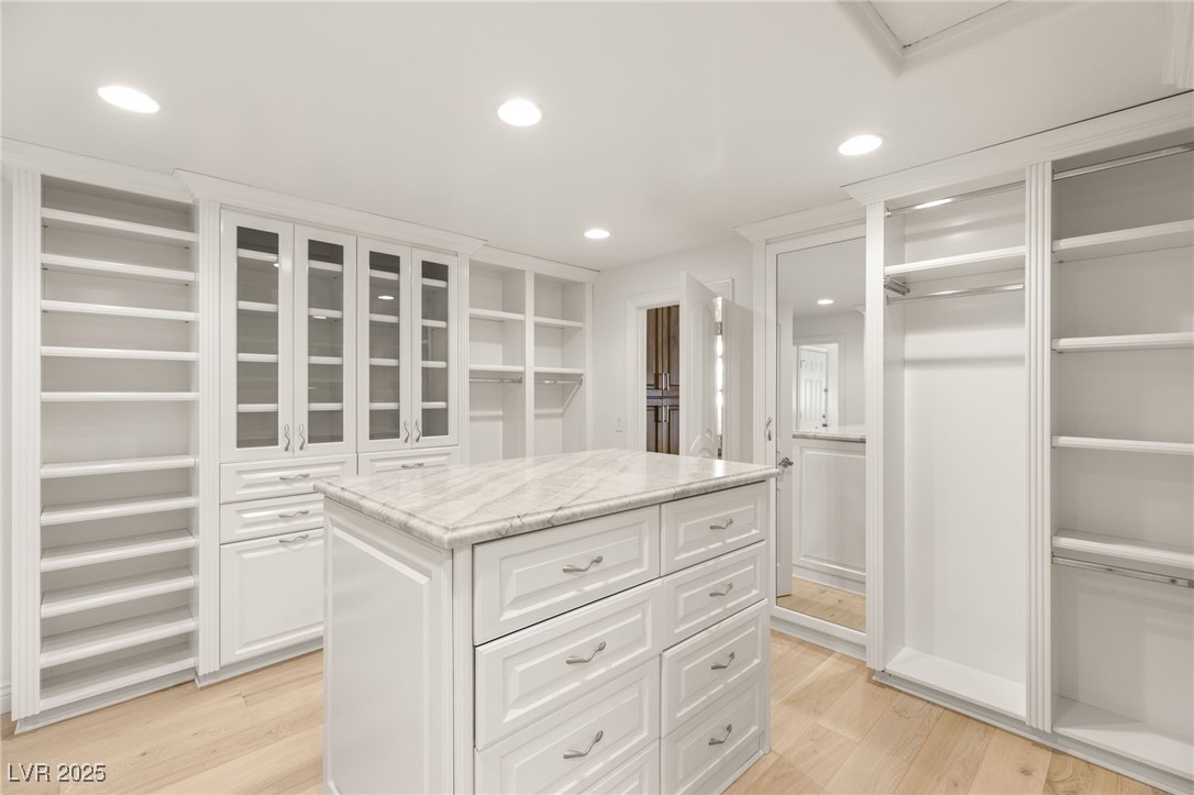 105 Quail Run Road Henderson, NV 89014 - Photo 30 of 88 Walk in closet featuring light wood-style flooring