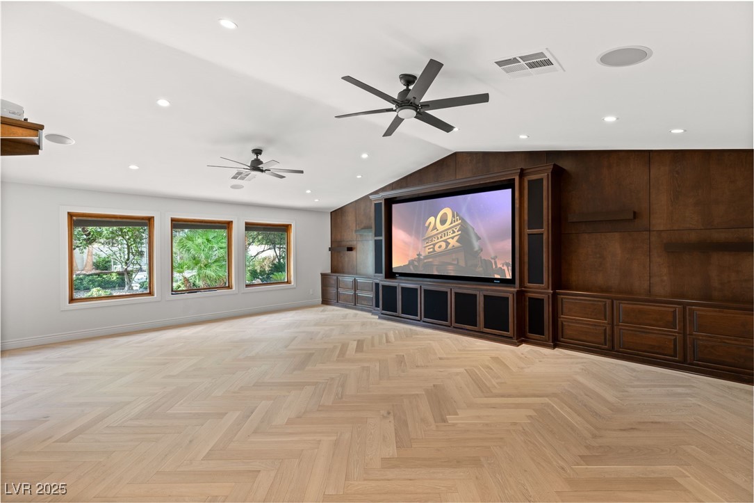 105 Quail Run Road Henderson, NV 89014 - Photo 32 of 88 Cinema with ceiling fan, lofted ceiling, and reces