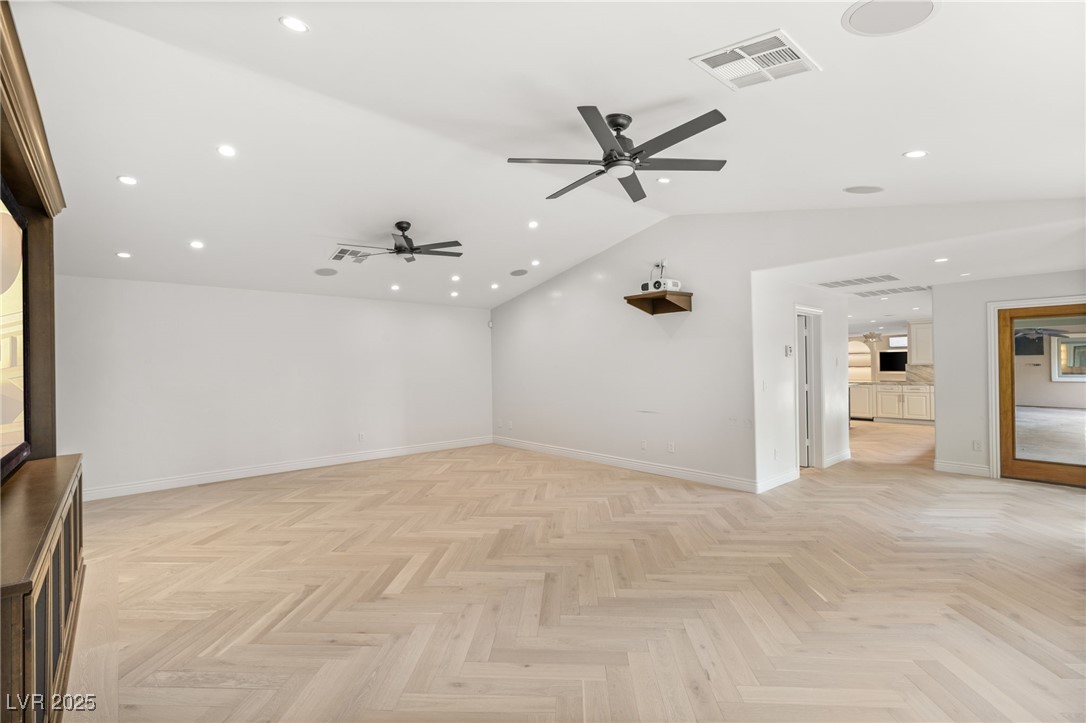 105 Quail Run Road Henderson, NV 89014 - Photo 33 of 88 Empty room with a ceiling fan, lofted ceiling, and