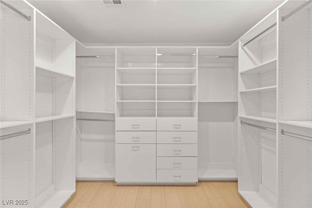 105 Quail Run Road Henderson, NV 89014 - Photo 47 of 88 Spacious closet featuring light wood finished floo