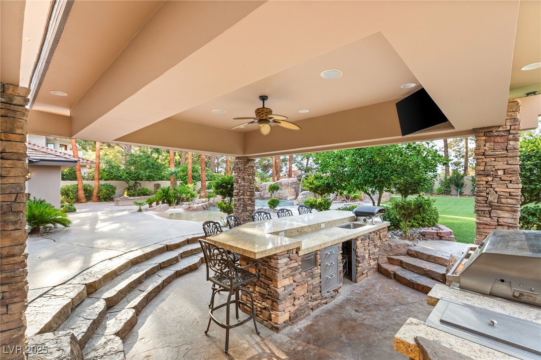 105 Quail Run Road Henderson, NV 89014 - Photo 57 of 88 View of patio featuring area for grilling and a ce
