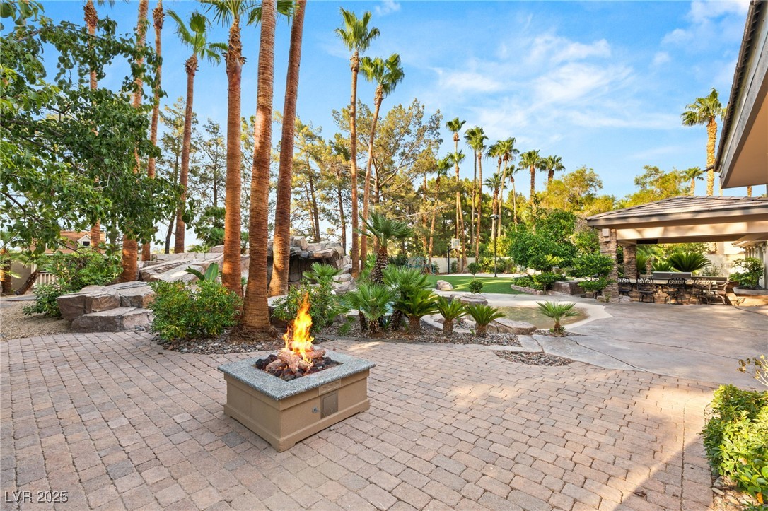 105 Quail Run Road Henderson, NV 89014 - Photo 59 of 88 View of patio / terrace with a fire pit