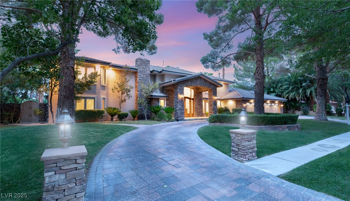 105 Quail Run Road Henderson, NV 89014 - Photo 68 of 88 View of front of property with a chimney, a gate,