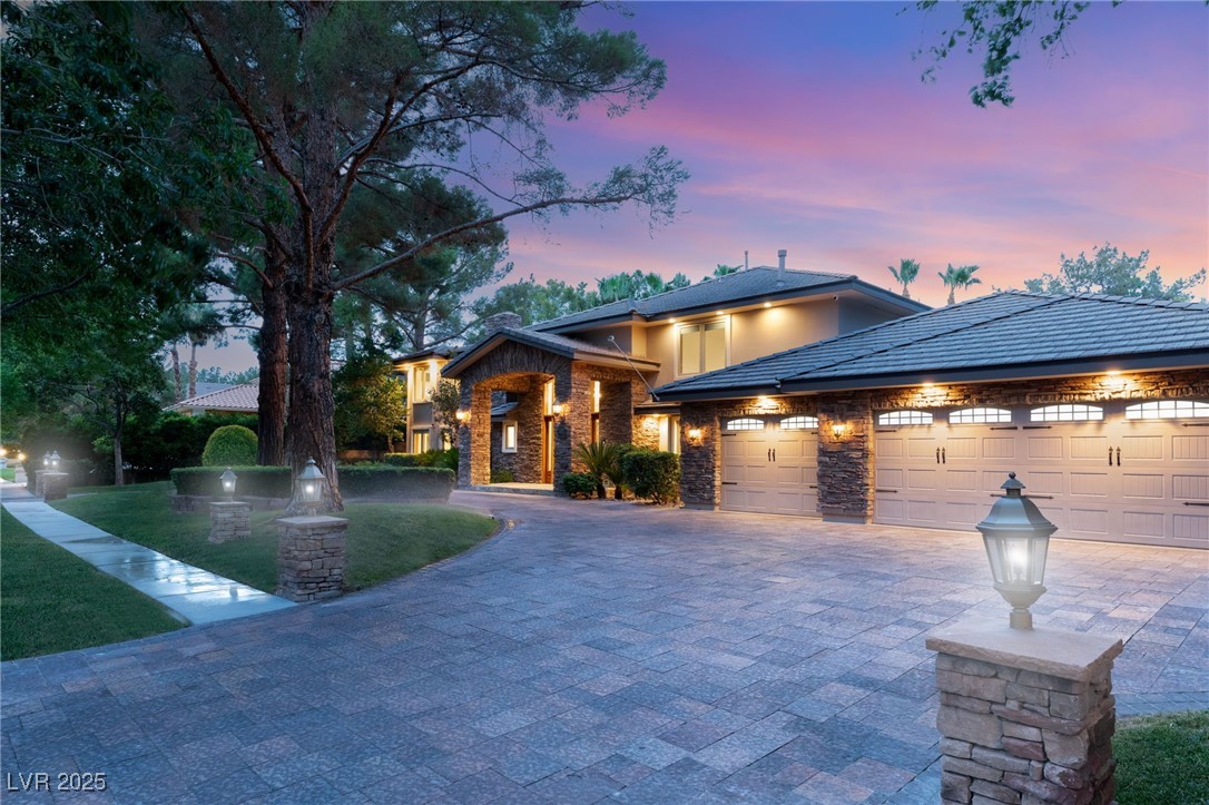 105 Quail Run Road Henderson, NV 89014 - Photo 69 of 88 Prairie-style house with decorative driveway, a ga