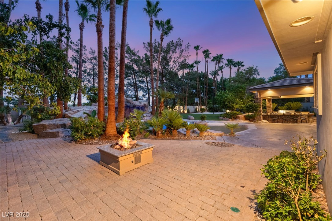 105 Quail Run Road Henderson, NV 89014 - Photo 73 of 88 View of patio with a fire pit