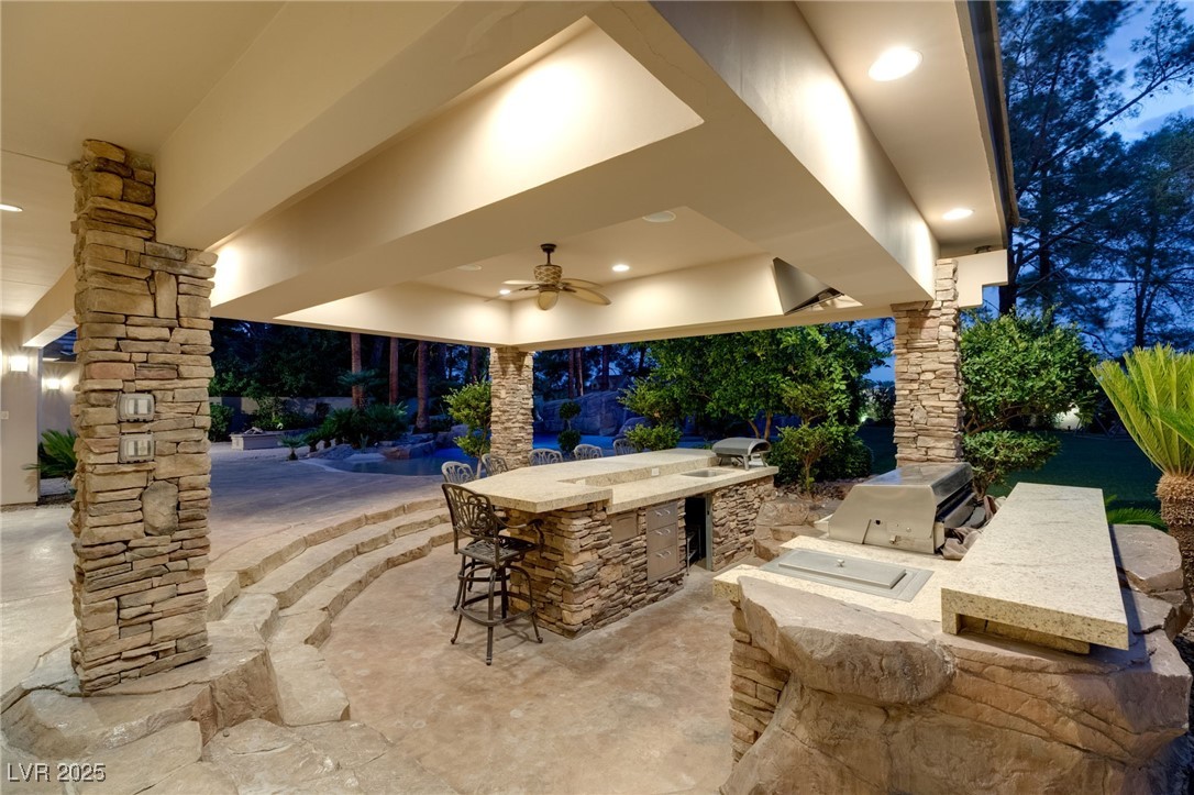 105 Quail Run Road Henderson, NV 89014 - Photo 79 of 88 View of patio / terrace with an outdoor kitchen an