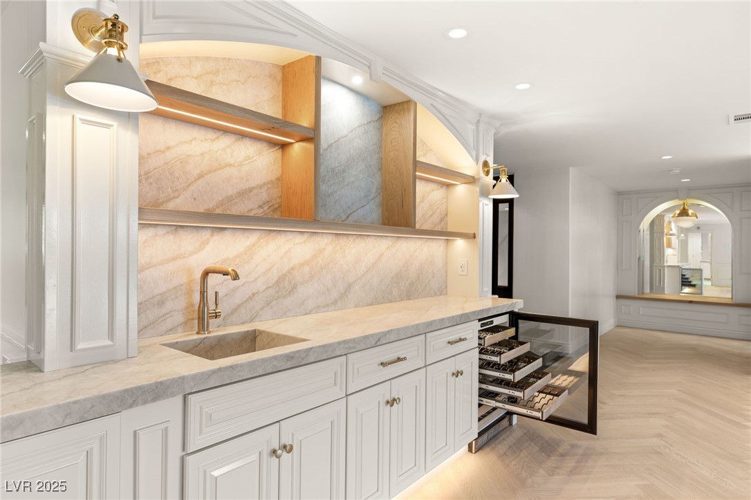105 Quail Run Road Henderson, NV 89014 - Photo 9 of 88 Indoor wet bar featuring recessed lighting, backsp