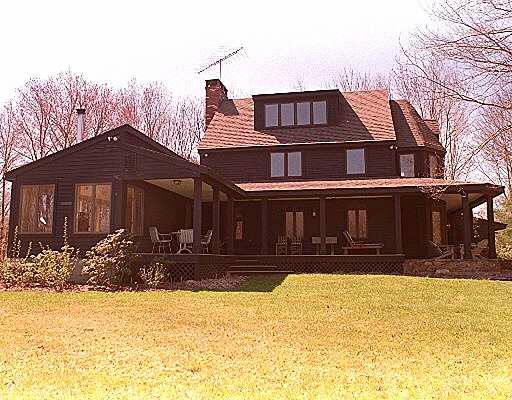 11 Crofut Road Roxbury, CT 06783 - Photo 1 of 1 a front view of a house with a yard