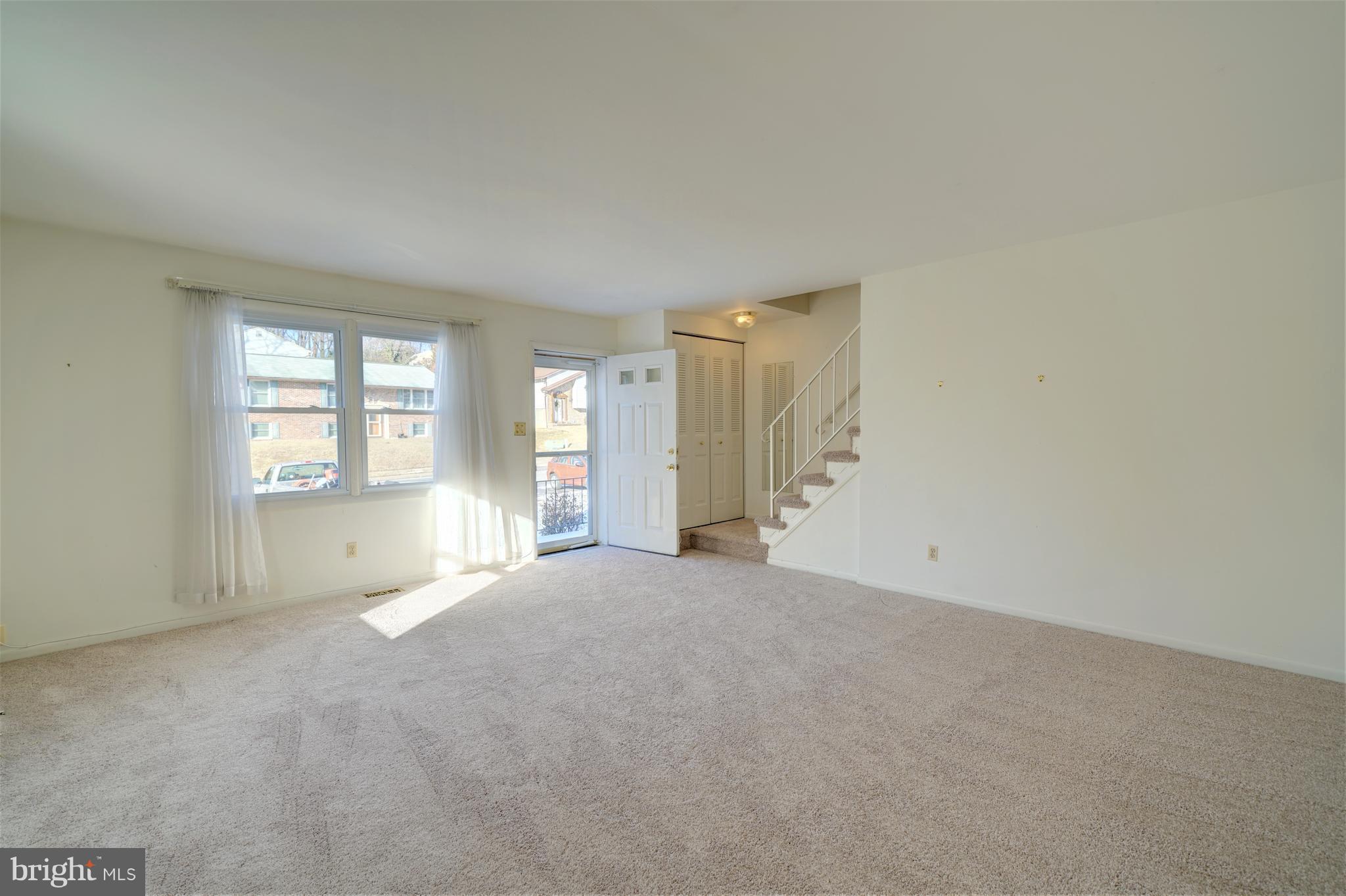 9923 Maidbrook Road Baltimore, MD 21234 - Photo 4 of 30 Enter into huge living room. New carpeting!