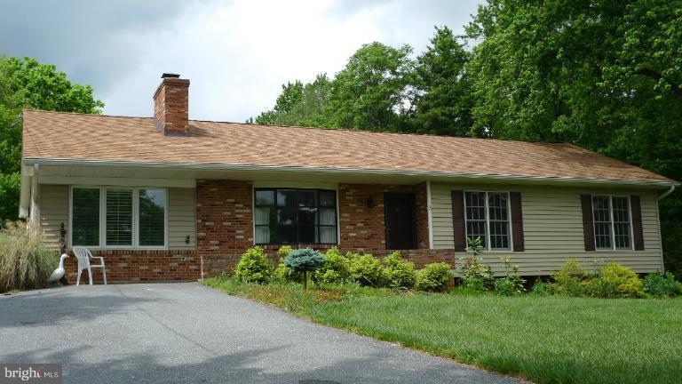 13852 Penn Shop Road Mount Airy, MD 21771 - Photo 3 of 30 a front view of a house with garden