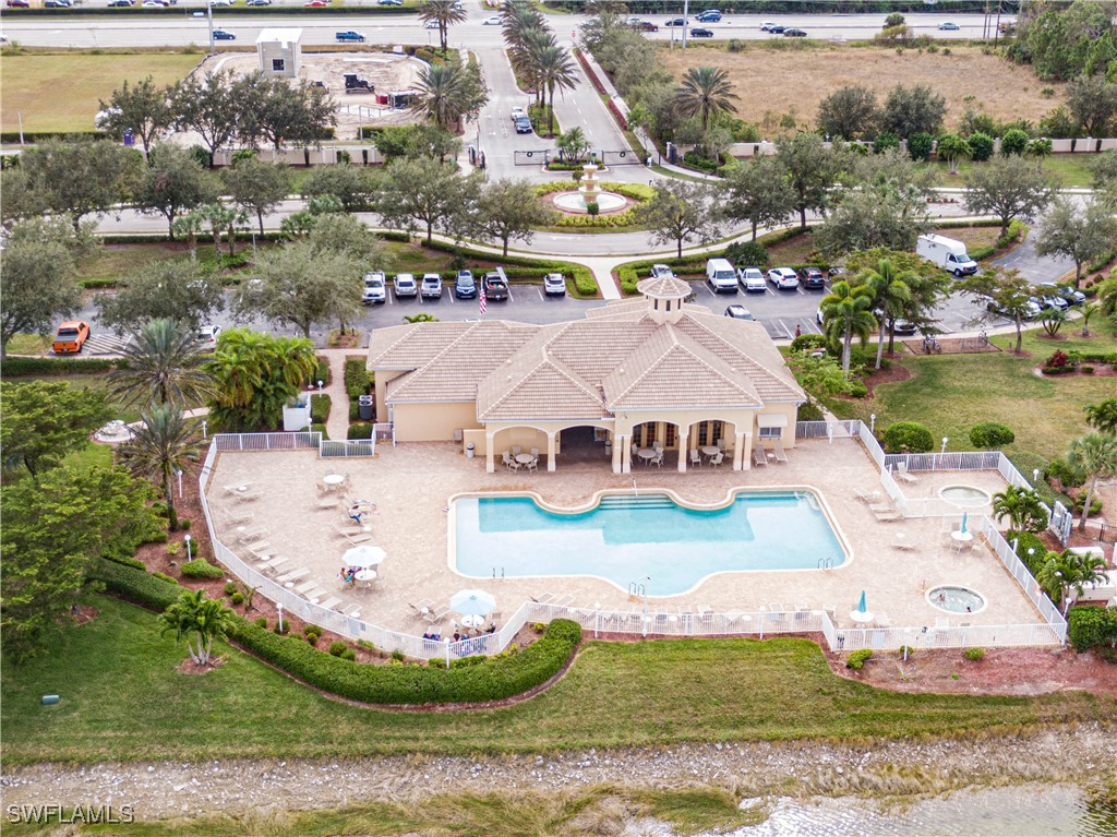 11753 Eros Road Lehigh Acres, FL 33971 - Photo 30 of 34 an aerial view of a house