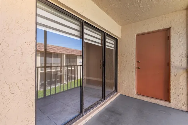a bathroom with a sink a mirror and a vanity