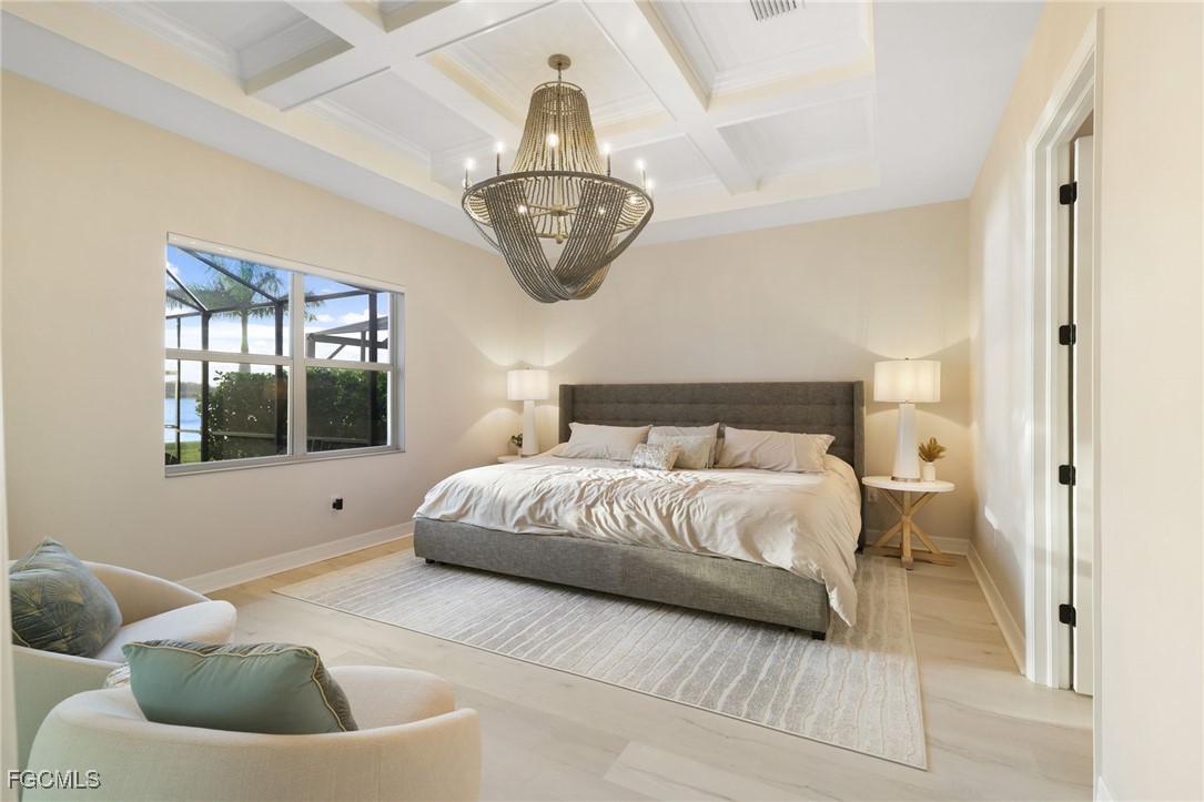 13670 Blue Bay Circle Fort Myers, FL 33913 - Photo 14 of 50 a spacious bedroom with a bed and window