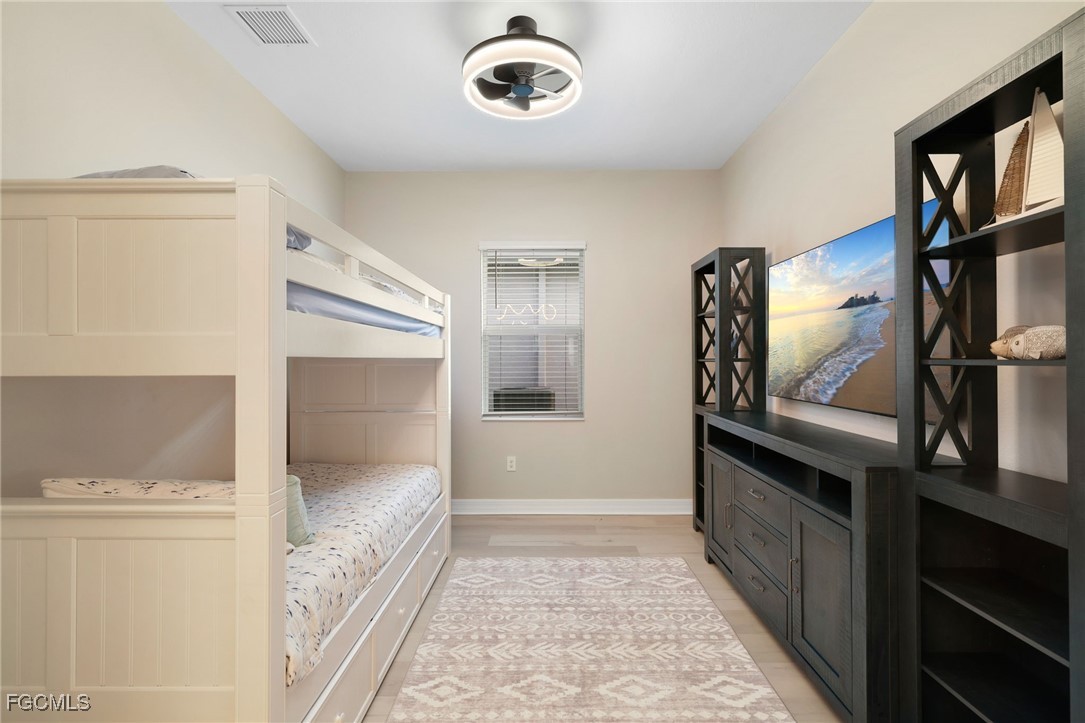 13670 Blue Bay Circle Fort Myers, FL 33913 - Photo 21 of 50 a bathroom with a bathtub and a shower