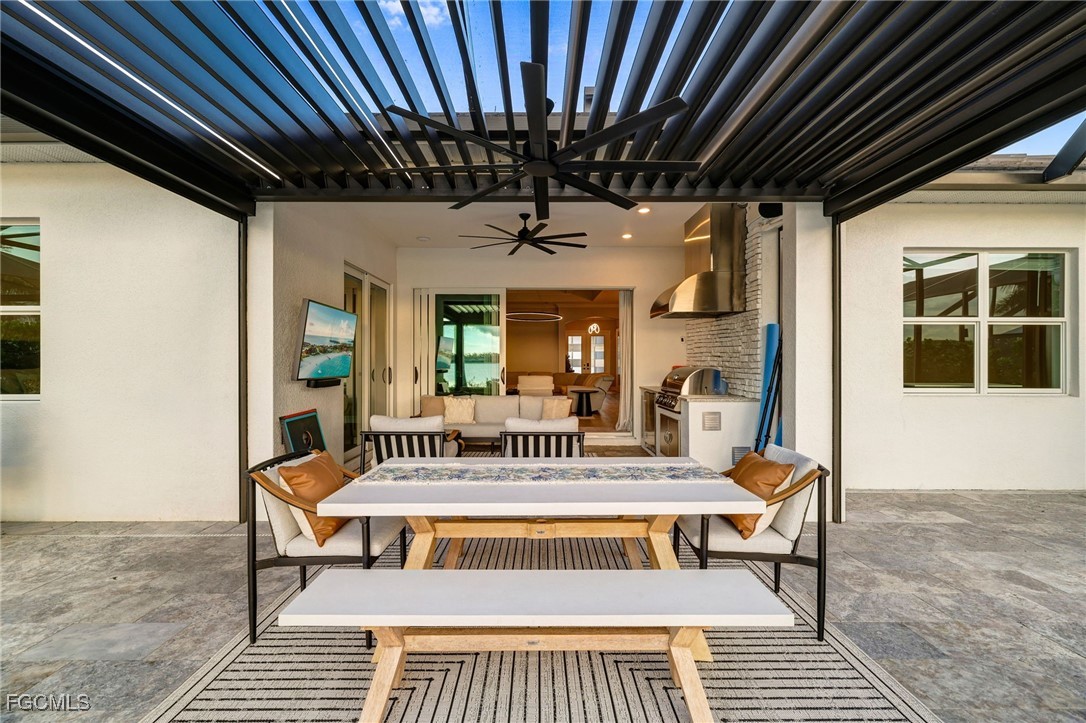 13670 Blue Bay Circle Fort Myers, FL 33913 - Photo 28 of 50 a view of a house with a lounge chair