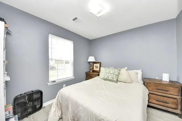 a view of backyard with furniture and garden