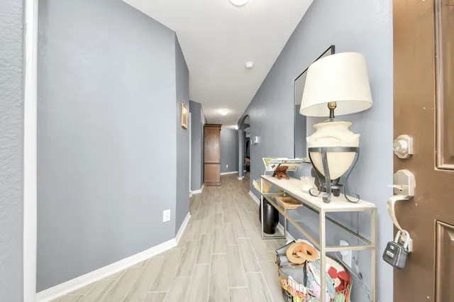 a bathroom with a sink a mirror and a shower