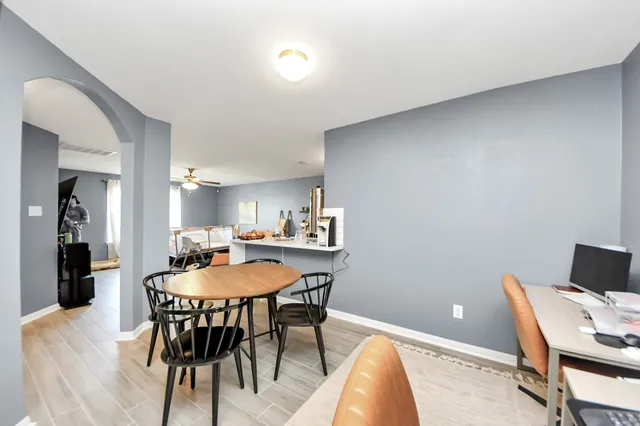 a view of a dining room with furniture