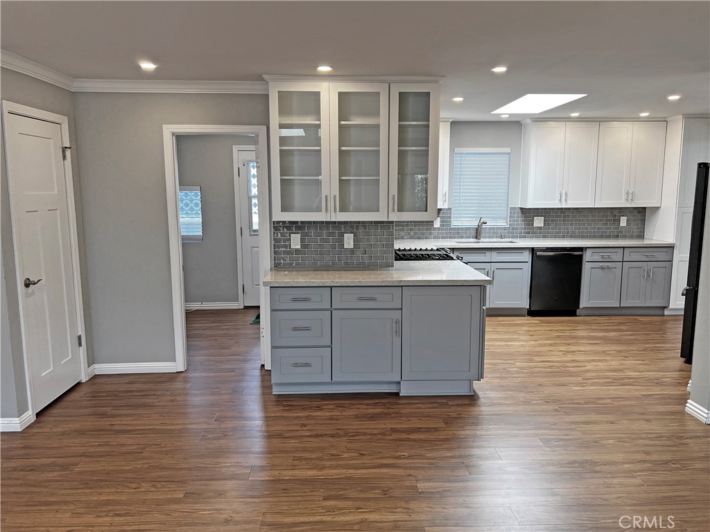 1352 Silver Lake Place, Unit 87 Brea, CA 92821 - Photo 16 of 51 a large kitchen with stainless steel appliances granite countertop a stove and a sink