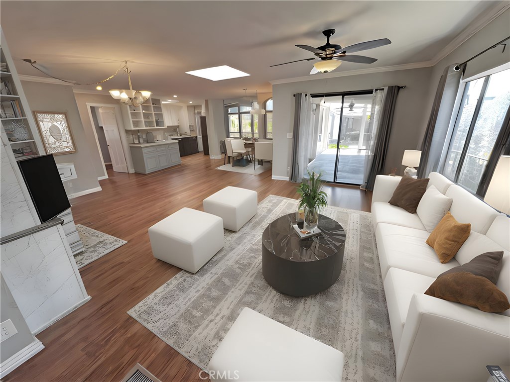 1352 Silver Lake Place, Unit 87 Brea, CA 92821 - Photo 21 of 51 a living room with furniture and a chandelier