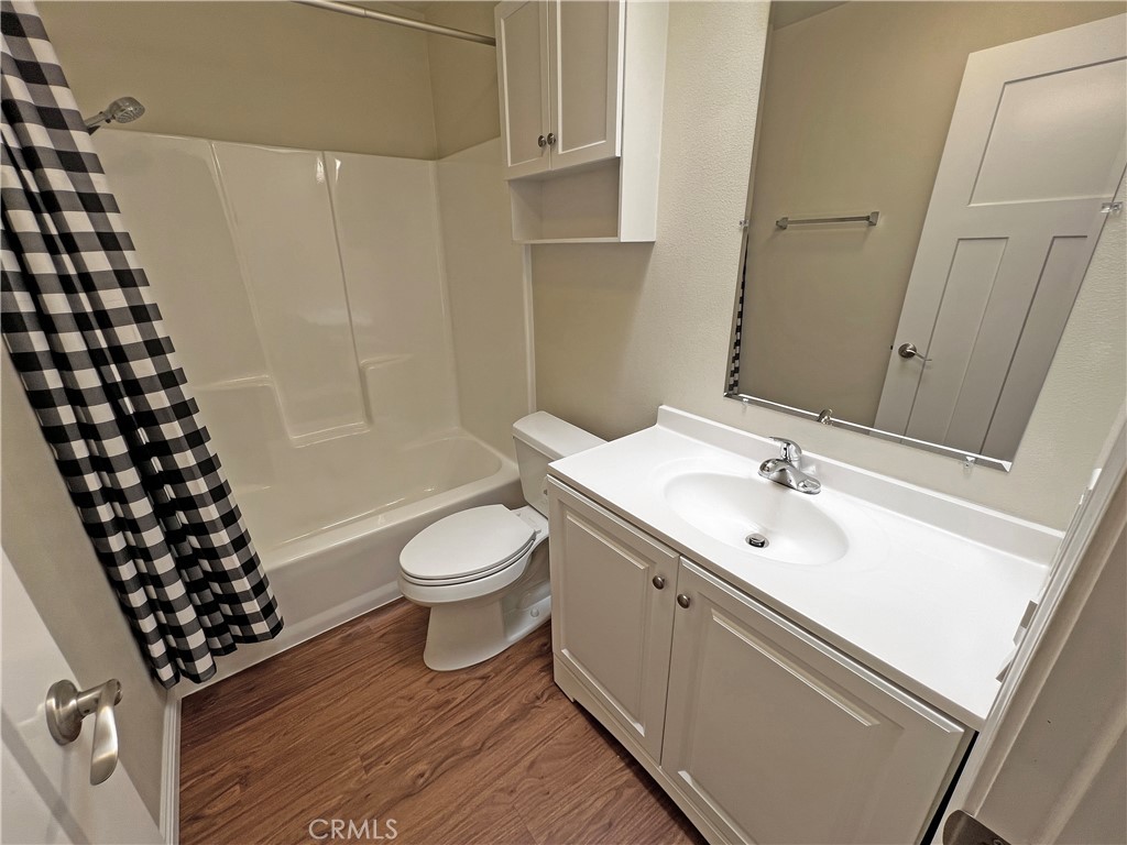 1352 Silver Lake Place, Unit 87 Brea, CA 92821 - Photo 30 of 51 a bathroom with a sink toilet and shower