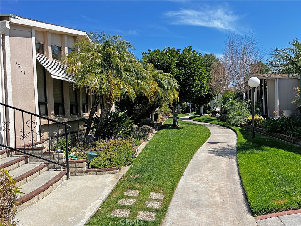 1352 Silver Lake Place, Unit 87 Brea, CA 92821 - Photo 37 of 51 a view of a house with a yard
