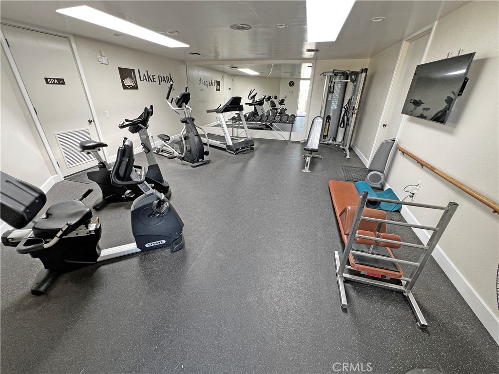 1352 Silver Lake Place, Unit 87 Brea, CA 92821 - Photo 43 of 51 a view of a room with gym equipment