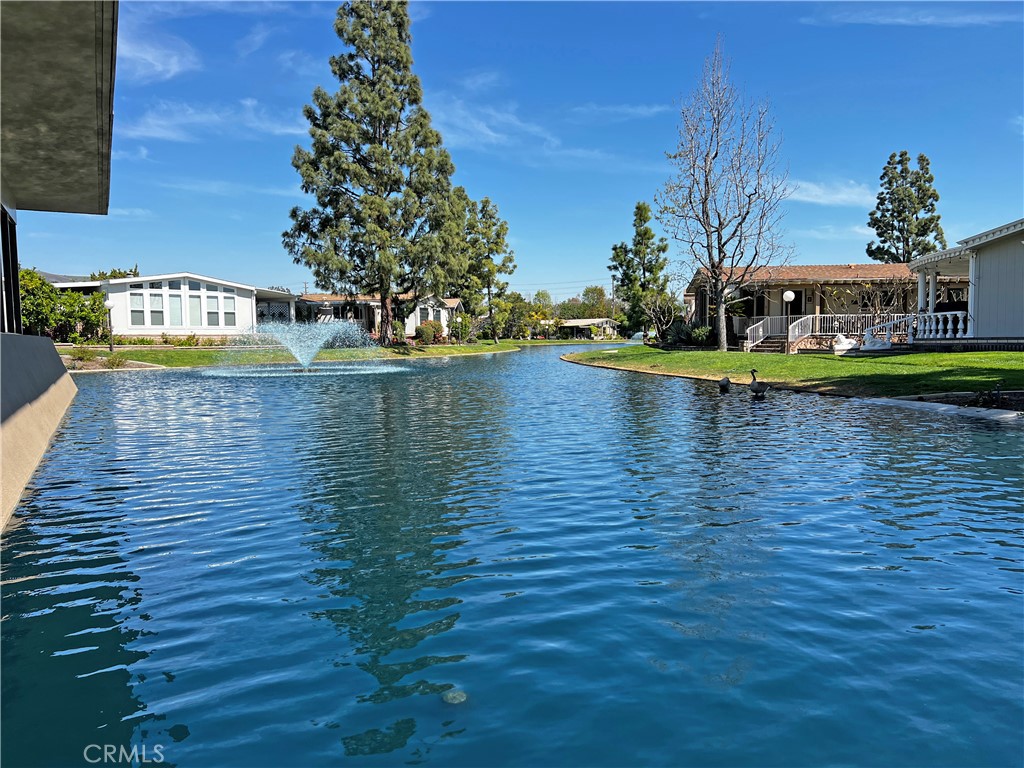 1352 Silver Lake Place, Unit 87 Brea, CA 92821 - Photo 49 of 51 a view of a swimming pool and an outdoor space