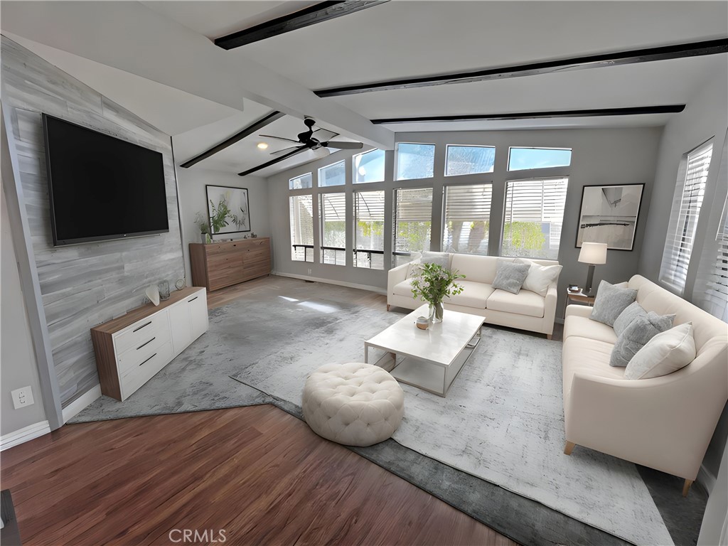 1352 Silver Lake Place, Unit 87 Brea, CA 92821 - Photo 6 of 51 a living room with furniture and a flat screen tv