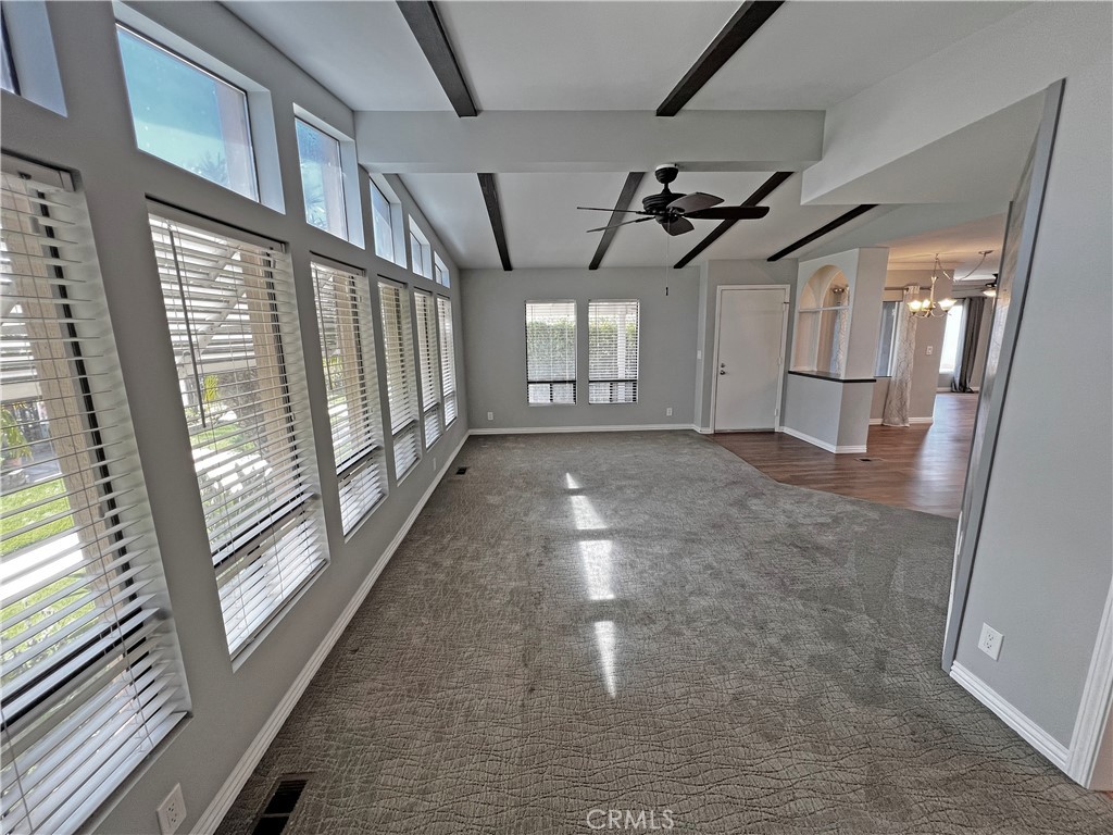 1352 Silver Lake Place, Unit 87 Brea, CA 92821 - Photo 8 of 51 a view of empty room with wooden floor and fan