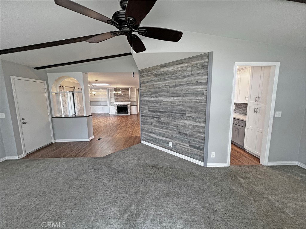 1352 Silver Lake Place, Unit 87 Brea, CA 92821 - Photo 9 of 51 a view of a room with an empty space and a ceiling fan