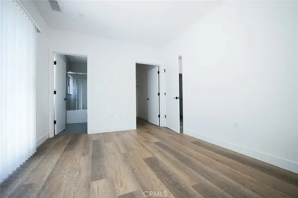 a kitchen with stainless steel appliances a refrigerator sink and stove
