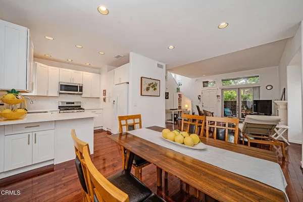 a view of a dining room with furniture