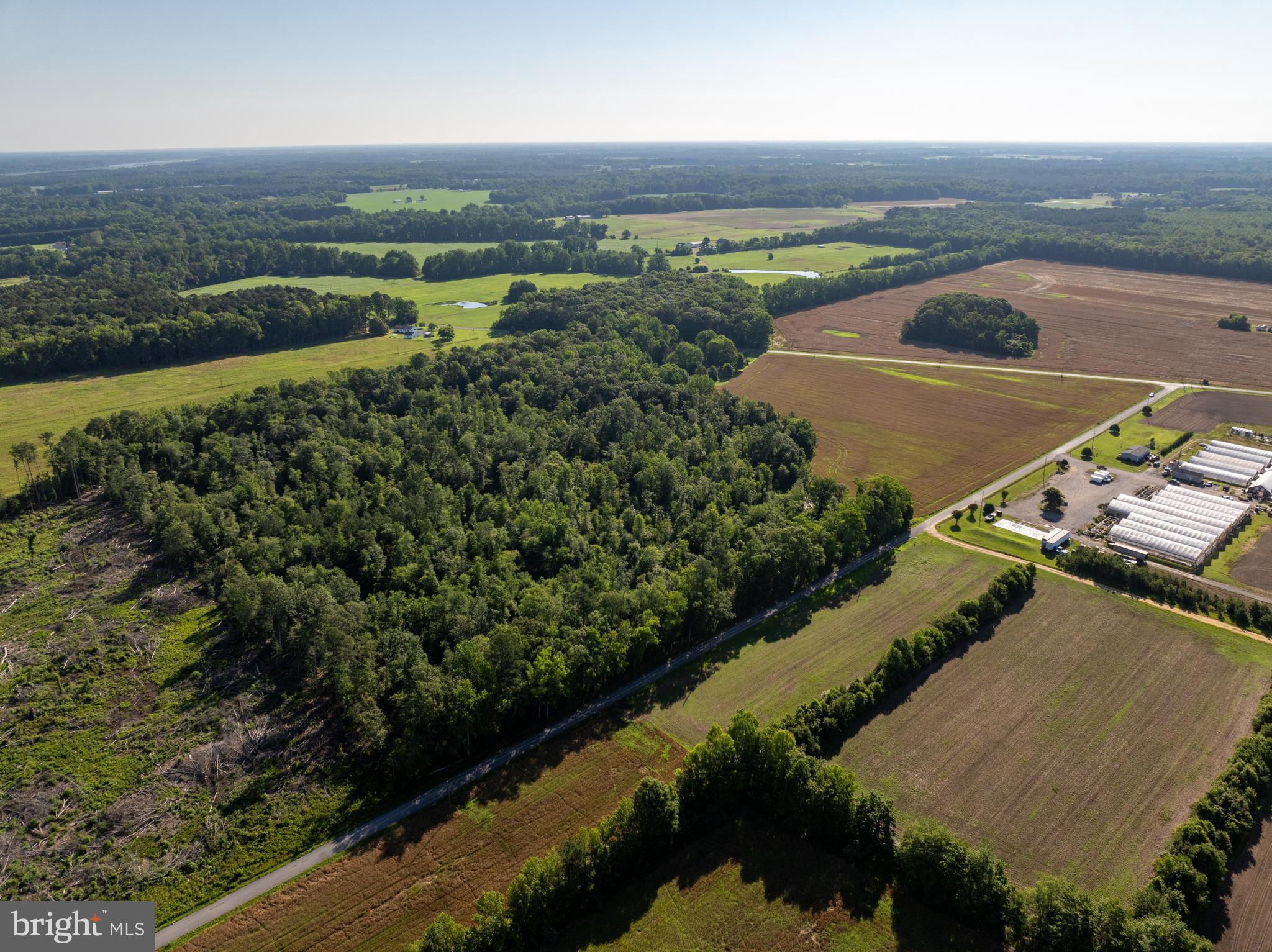 4516 Frazier Neck Road Preston, MD 21655 - Photo 3 of 13 an aerial view of a city and lake view
