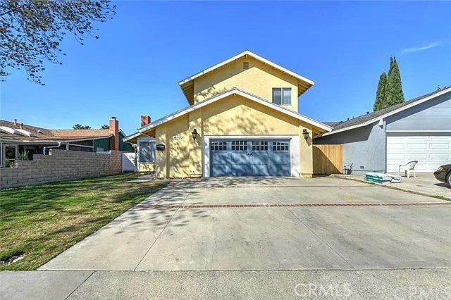 14911 Doheny Circle Irvine, CA 92604 - Photo 1 of 10 a front view of a house with a yard