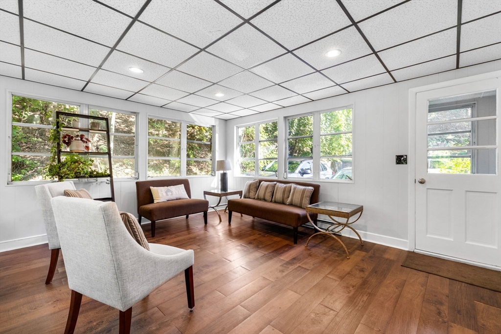 10 Marie Avenue Stoneham, MA 02180 - Photo 12 of 41 a living room with furniture and a wooden floor