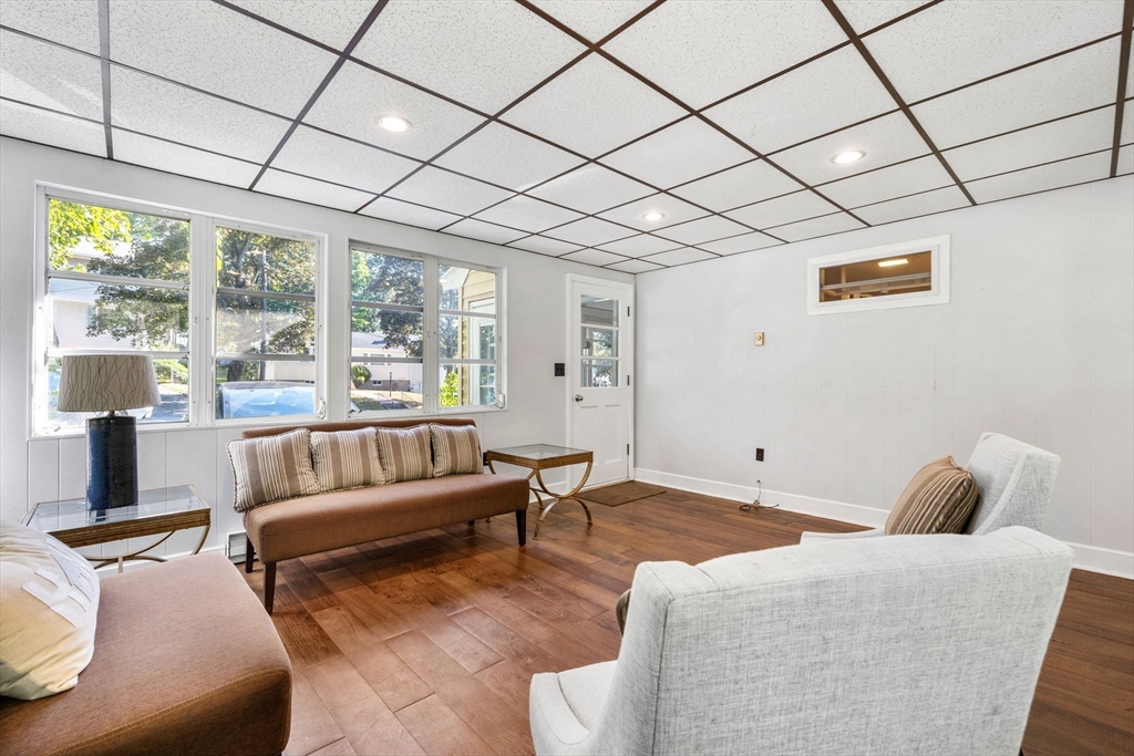 10 Marie Avenue Stoneham, MA 02180 - Photo 13 of 41 a living room with furniture and a large window