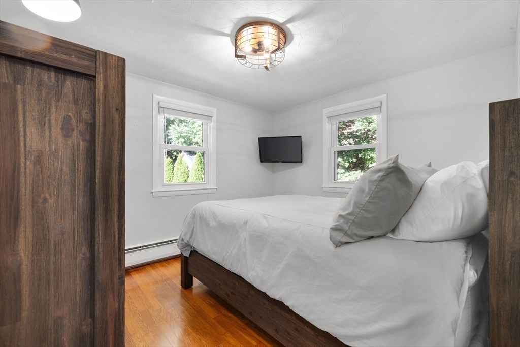 10 Marie Avenue Stoneham, MA 02180 - Photo 18 of 41 a bedroom with a bed and a window